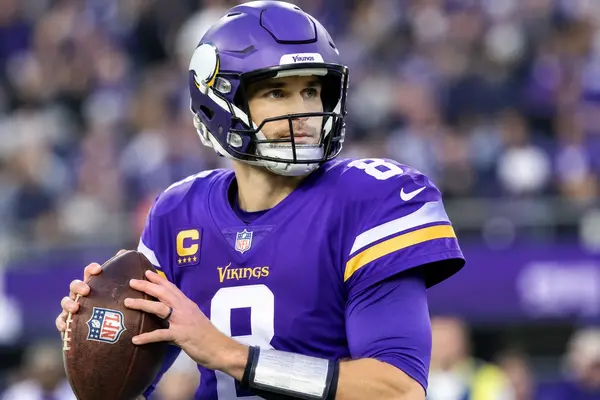 Kirk Cousins wearing a Minnesota Vikings football uniform