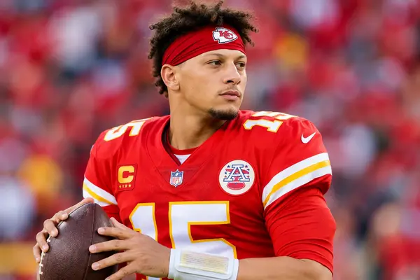 Patrick Mahomes playing football as an NFL quarterback